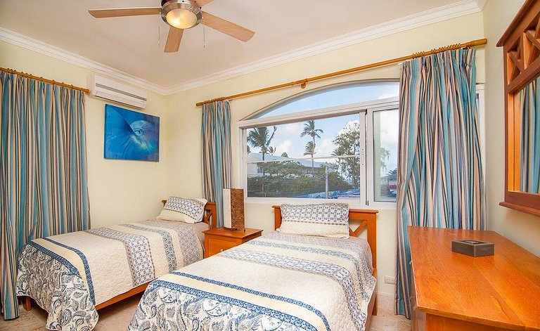 2 bedrooms, 2 bathrooms, steps from the beach.